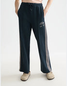 Midnight Iz Interlock Sweatpants close-up on model by Scotch & Soda