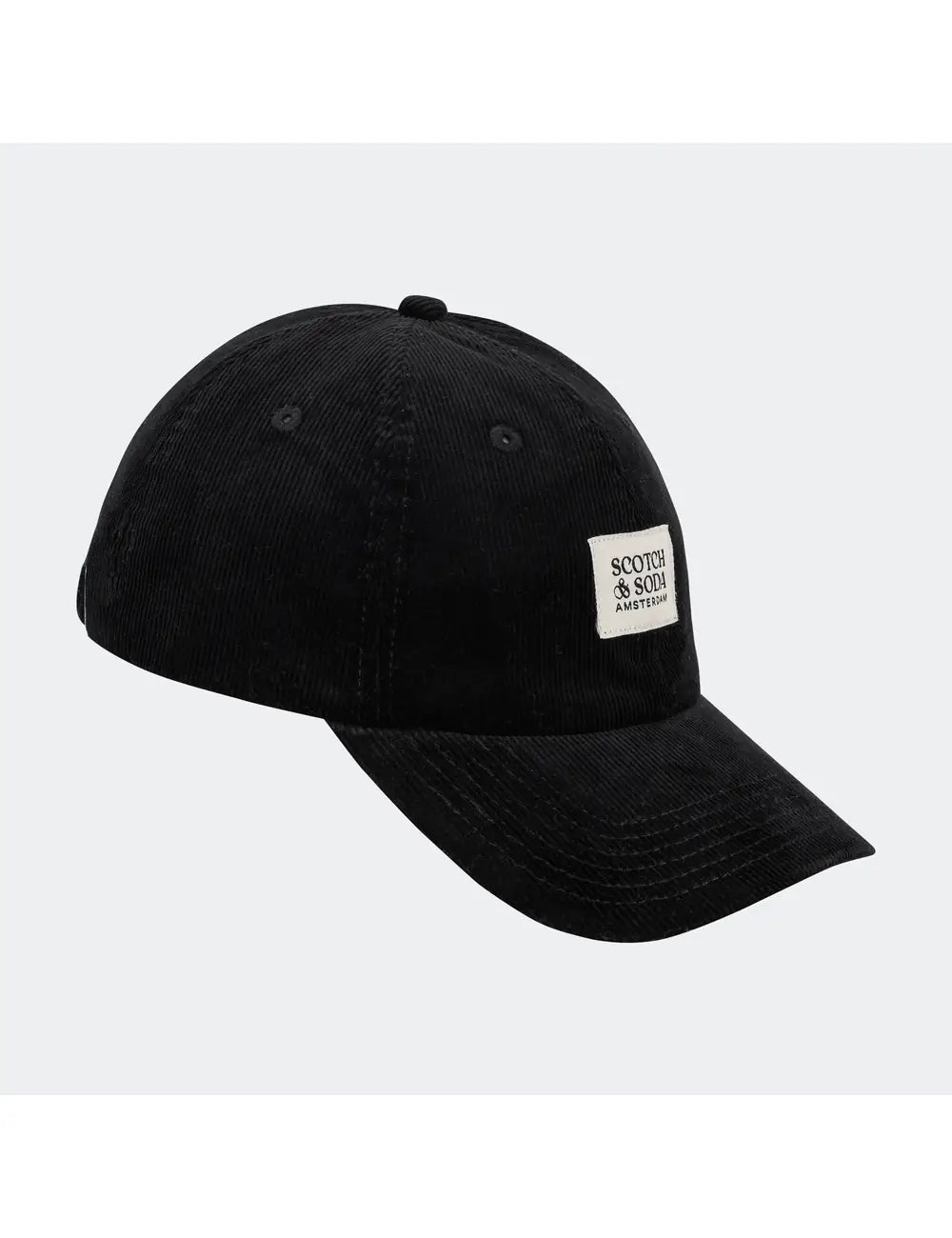 Black cap with a logo patch on a light gray background