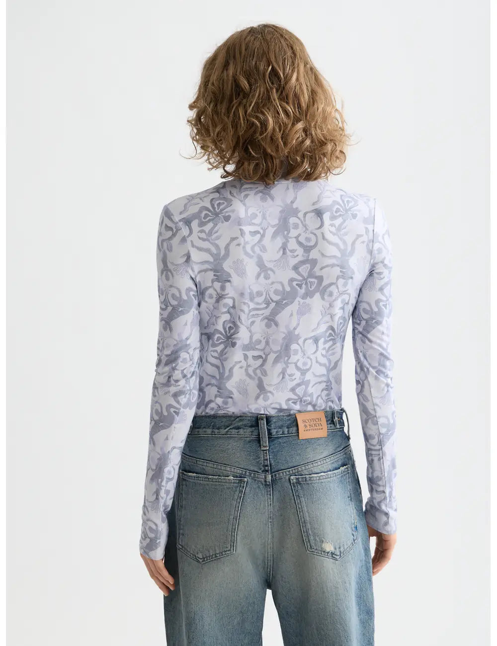 Printed Mock Neck Tee detail shot showing fabric and craftsmanship by Scotch & Soda