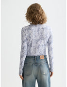 Printed Mock Neck Tee detail shot showing fabric and craftsmanship by Scotch & Soda