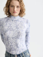 all-over-printed-mock-neck-long-sleeve-t-shirt detail shot by Scotch & Soda