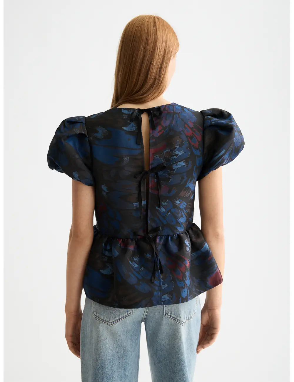 Cap Sleeve Peplum Top detail shot by Scotch & Soda