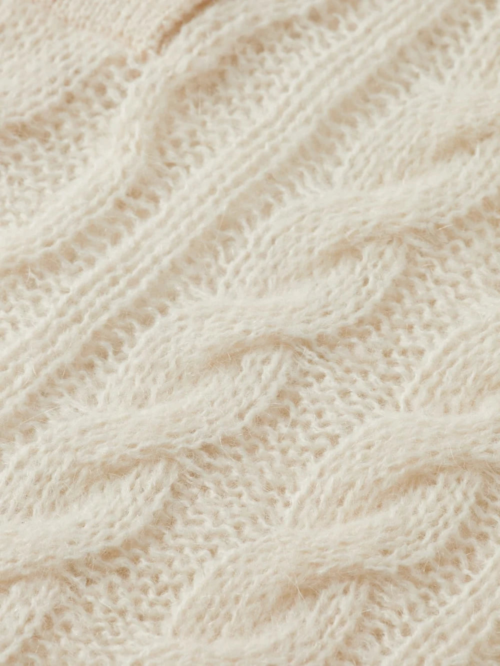 cable-stitch-polo-neck-pullover detail shot by Scotch & Soda