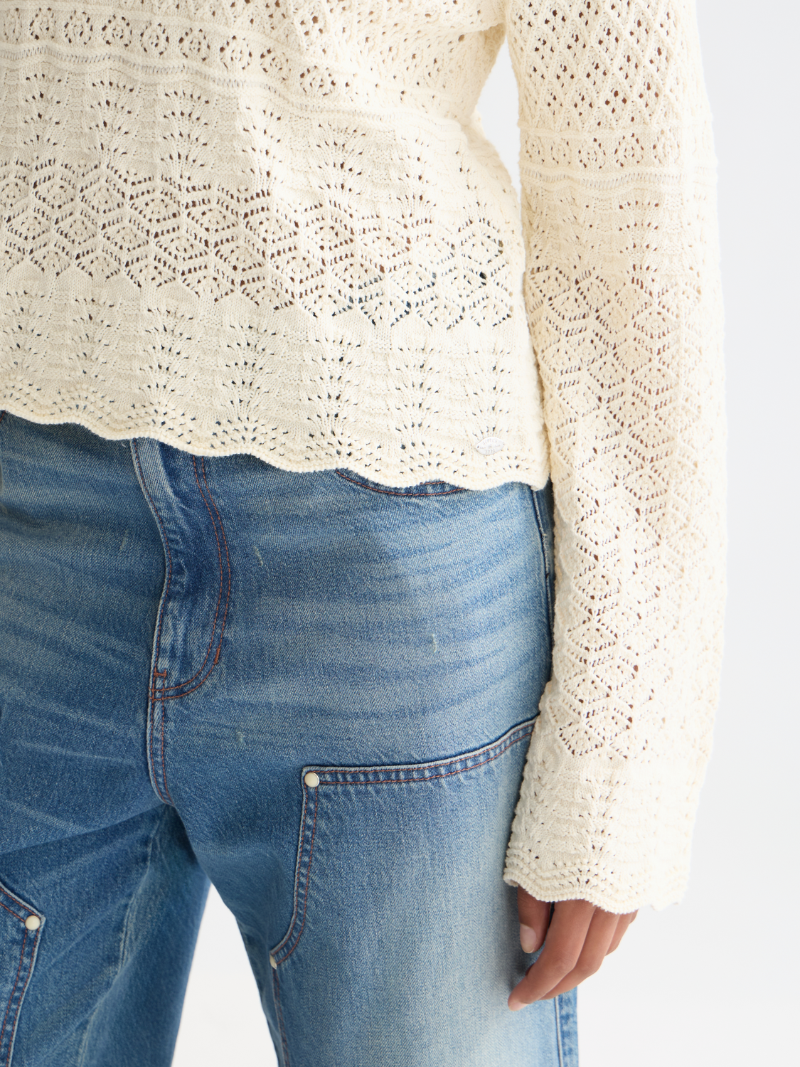 Pointelle stitch V-neck pullover