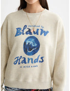 Washed Oversized Fit Sweatshirt close-up on model showing fit and detail by Scotch & Soda