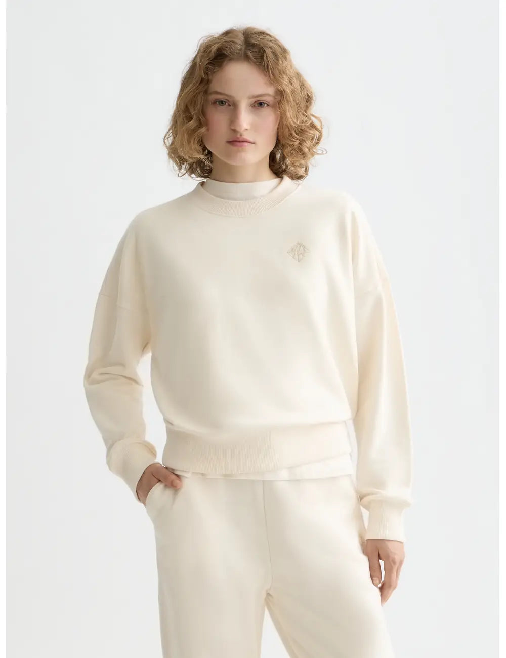 Off White Core Embroidered Logo Sweat-shirt close-up on model by Scotch & Soda