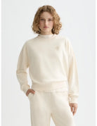 Off White Core Embroidered Logo Sweat-shirt close-up on model by Scotch & Soda