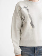 chest-artwork-relaxed-sweatshirt detail shot by Scotch & Soda