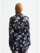 Festive Pyjama Blazer detail shot showing fabric and craftsmanship by Scotch & Soda