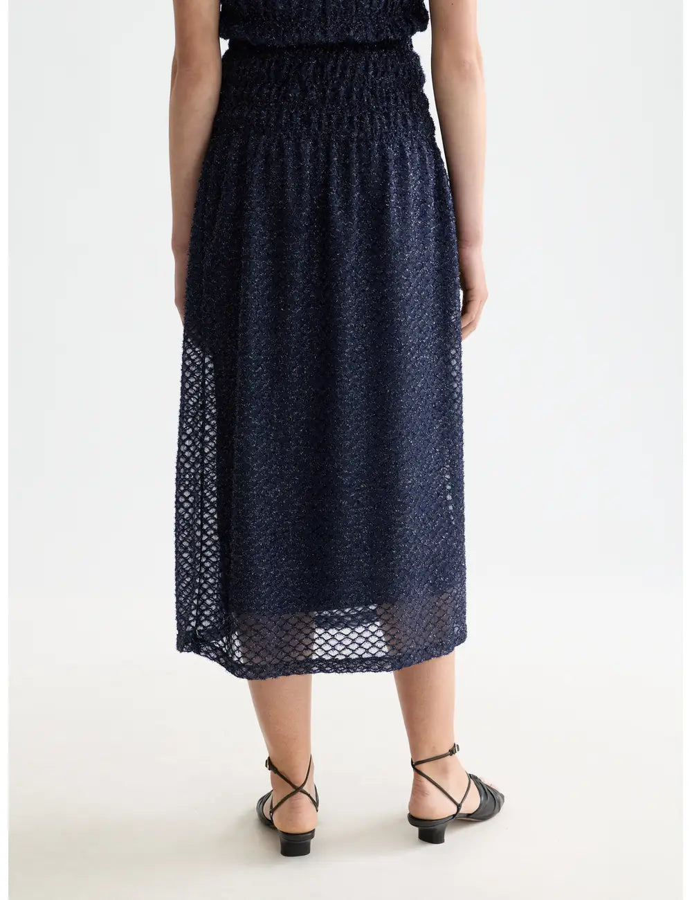 Lurex Smocked Skirt detail shot showing fabric and craftsmanship by Scotch & Soda