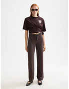 Knitted Metallic Trousers full model shot showing overall fit by Scotch & Soda