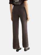 metallic-pointelle-knitted-trouser detail shot by Scotch & Soda