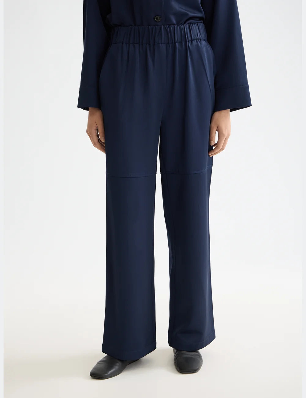 Satin Wide Leg Pants detail shot showing fabric and craftsmanship by Scotch & Soda