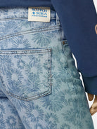 Sky High Rise Straight Jeans — Abstract Floral (University Gold) detail shot of fabric and craftsmanship by Scotch &...