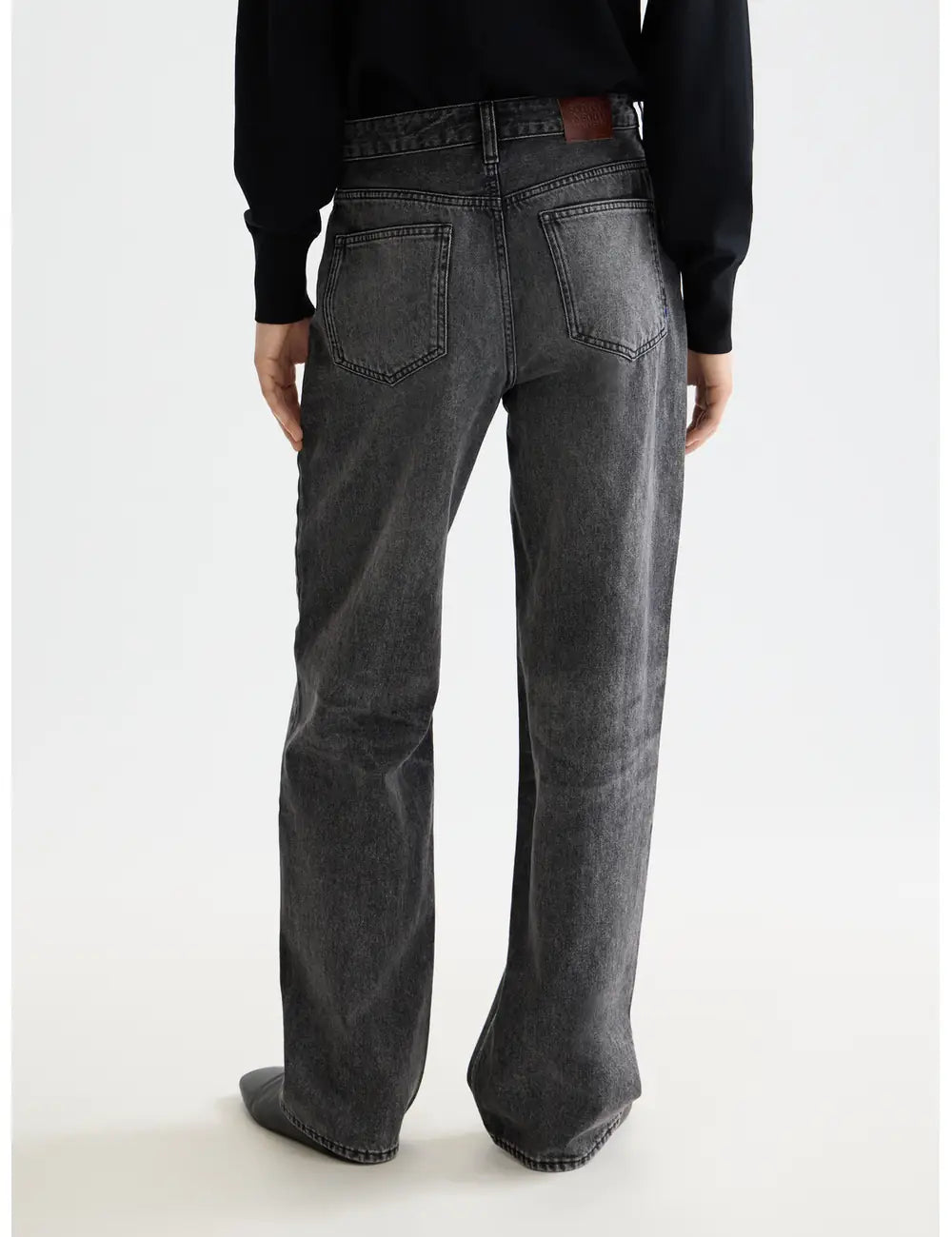 Core Ripple Straight Jeans  — Absolute Black detail shot of fabric and craftsmanship by Scotch & Soda