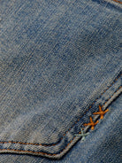 the-glow-bootcut-jeans-dirty-bertie detail shot by Scotch & Soda