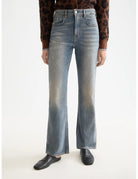 Glow Bootcut Jeans close-up on model showing fit and detail by Scotch & Soda