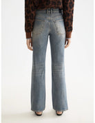 Glow Bootcut Jeans detail shot showing fabric and craftsmanship by Scotch & Soda