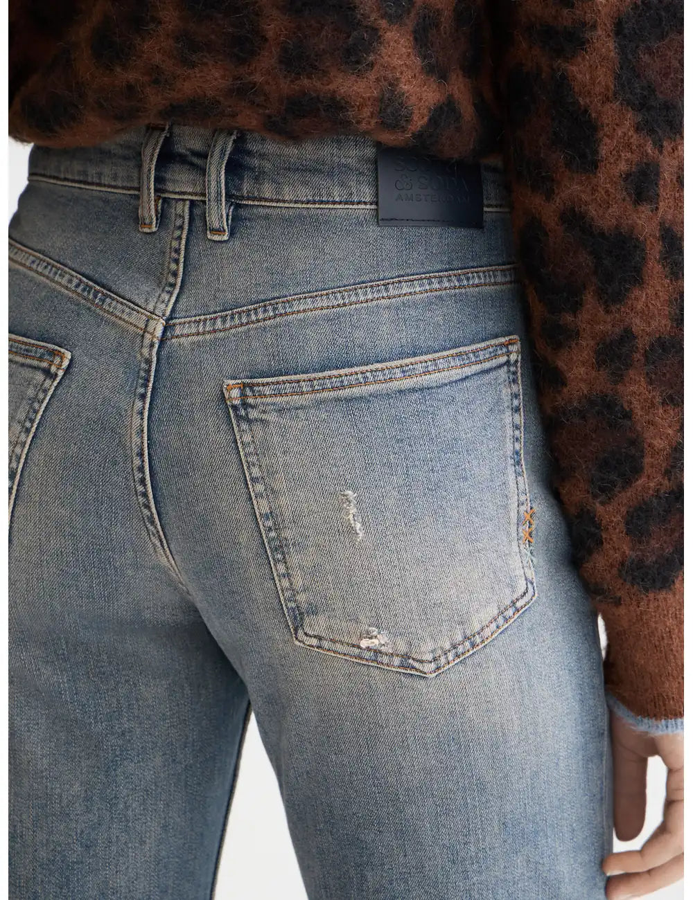 Glow Bootcut Jeans detail view by Scotch & Soda